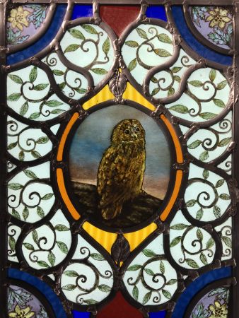 Victorian style stained glass panel with owl.