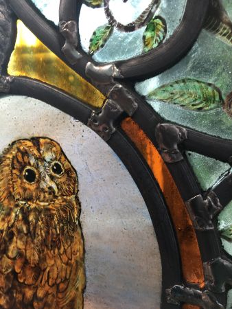 Victorian style stained glass panel with owl.