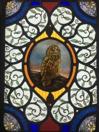 Victorian style stained glass panel with owl.