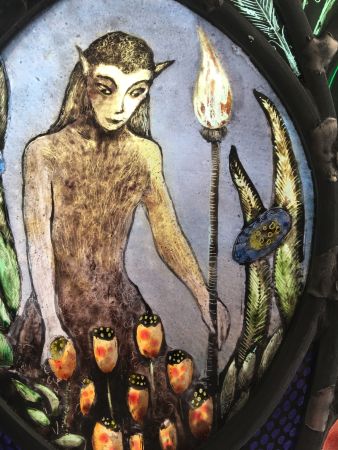 Small stained glass panel with nature spirit.