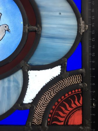 Victorian style stained glass panel with dove.