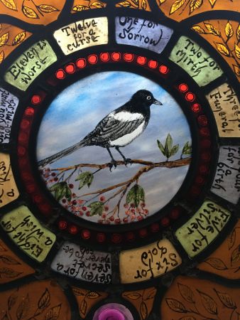 Magpie stained glass panel