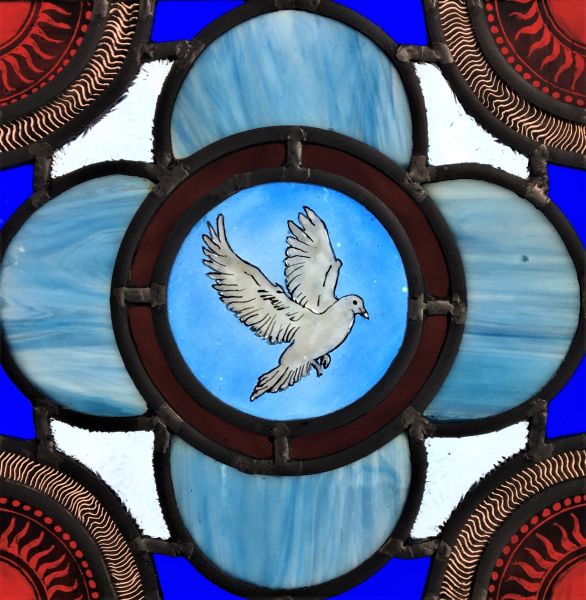 Victorian style stained glass panel with dove.